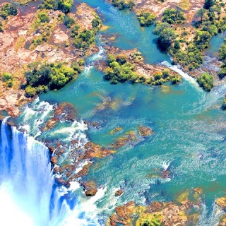 Victoria Falls by opalpeterliu 2016 Victoria Fall from helicopter IMG_8691 via photopin (license)